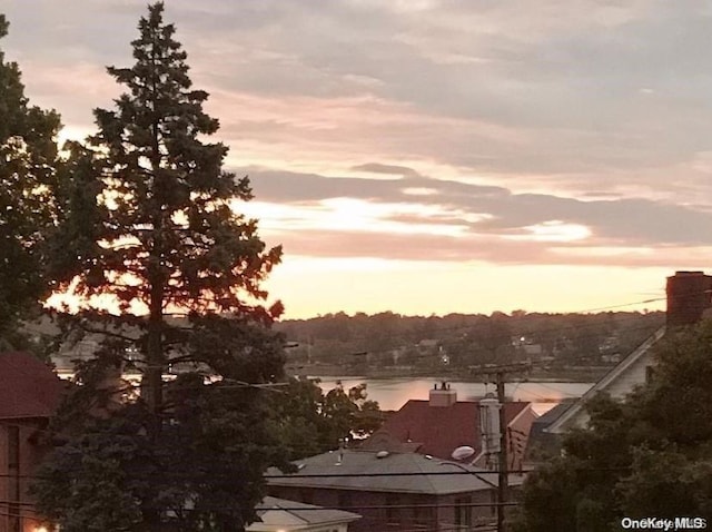 property's view of city with a water view