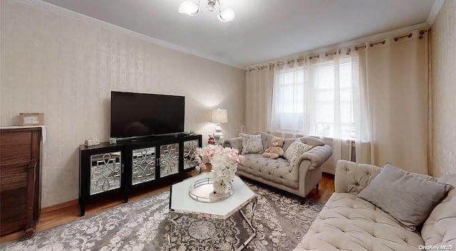 living room featuring hardwood / wood-style floors and ornamental molding