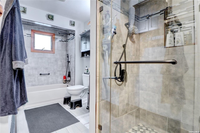 bathroom featuring tile patterned floors and toilet