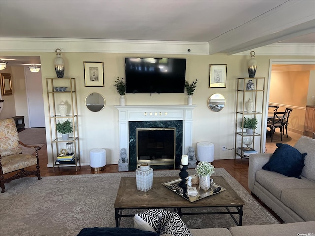 living room with dark hardwood / wood-style floors, beam ceiling, a premium fireplace, and crown molding