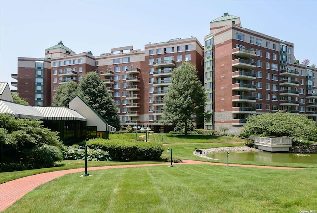 view of property with a water view