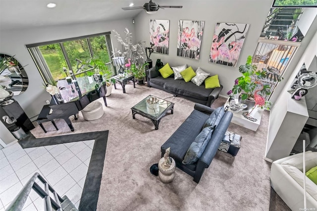 living room featuring carpet, vaulted ceiling, and ceiling fan