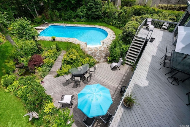 view of pool with a wooden deck