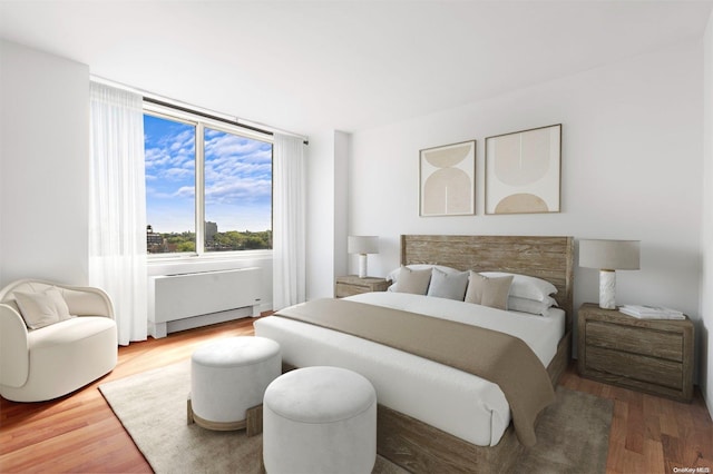 bedroom featuring hardwood / wood-style floors