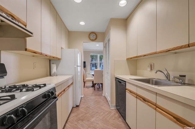 kitchen featuring gas range gas stove, exhaust hood, sink, dishwasher, and light parquet flooring