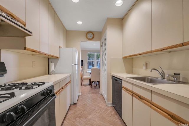 1390 Broadway Unit 116, Hewlett, NY 11557 - kitchen featuring range with gas cooktop, black dishwasher, extractor fan, light countertops, and recessed lighting
