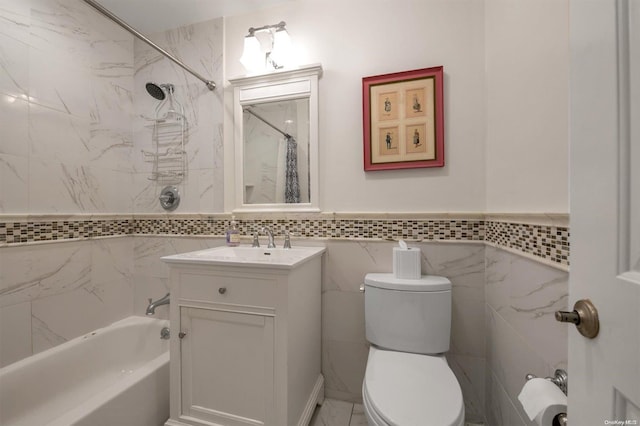 full bathroom with vanity, toilet, tile walls, and shower / tub combo with curtain