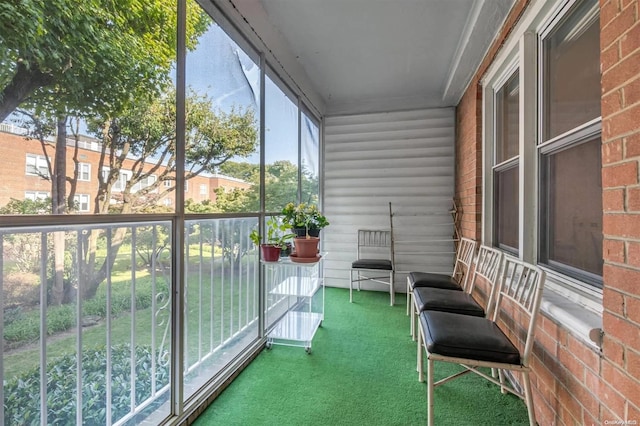 unfurnished sunroom with a wealth of natural light