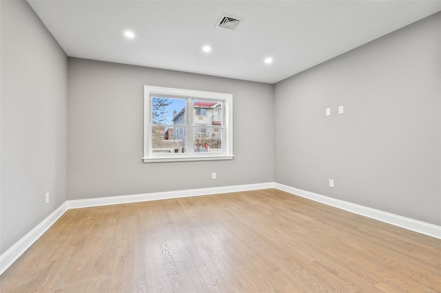 empty room with light wood-type flooring