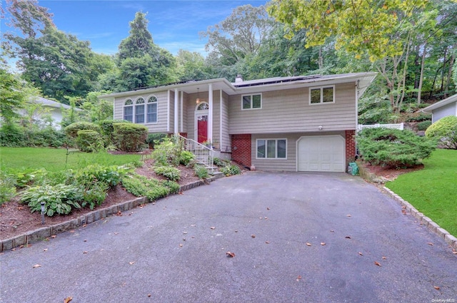 bi-level home with a garage