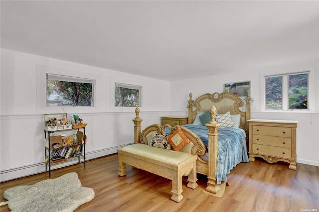 bedroom with light wood-type flooring