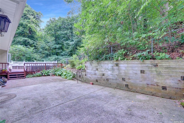 view of patio featuring a wooden deck