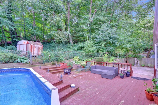 view of pool featuring outdoor lounge area and a deck