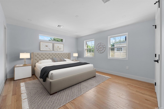 bedroom featuring light hardwood / wood-style flooring