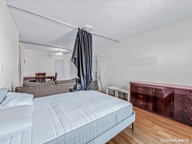 bedroom featuring light hardwood / wood-style floors