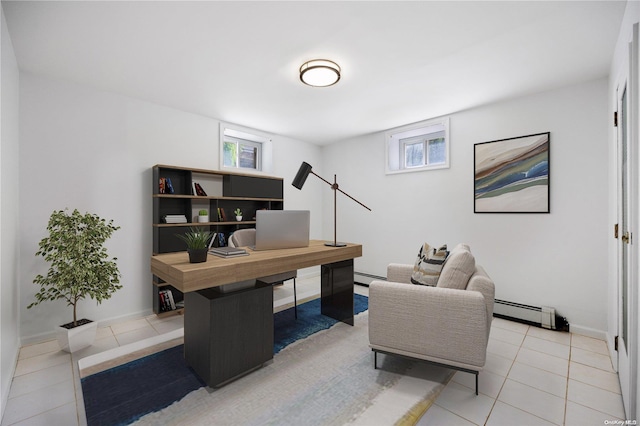 office space with light tile patterned floors and a baseboard heating unit