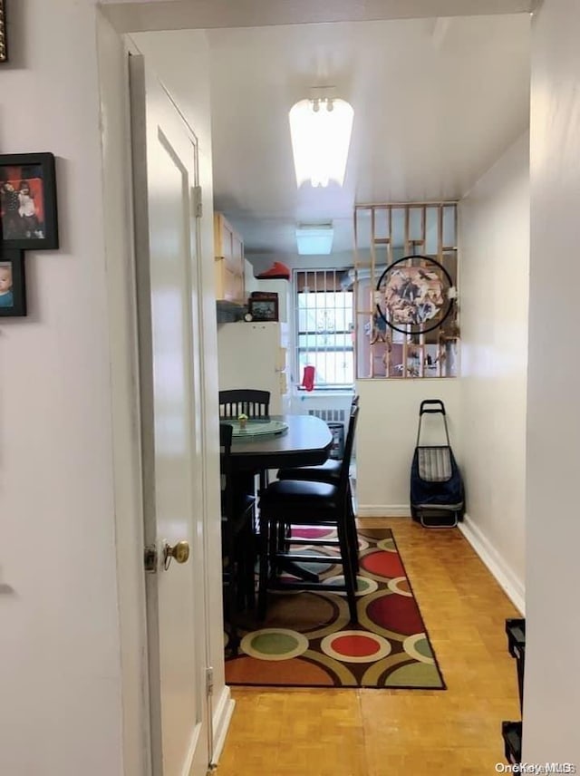 dining area with light hardwood / wood-style flooring