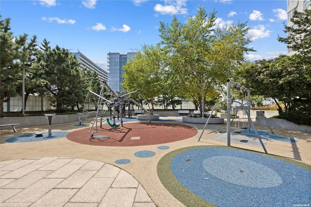 view of home's community featuring a playground