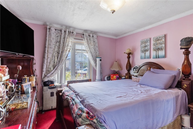 bedroom featuring carpet floors, a textured ceiling, and ornamental molding