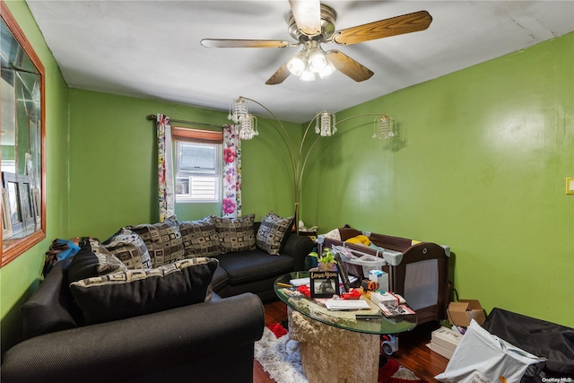 living room featuring hardwood / wood-style flooring and ceiling fan