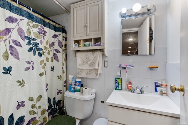 bathroom with vanity, a shower with shower curtain, tile walls, and toilet