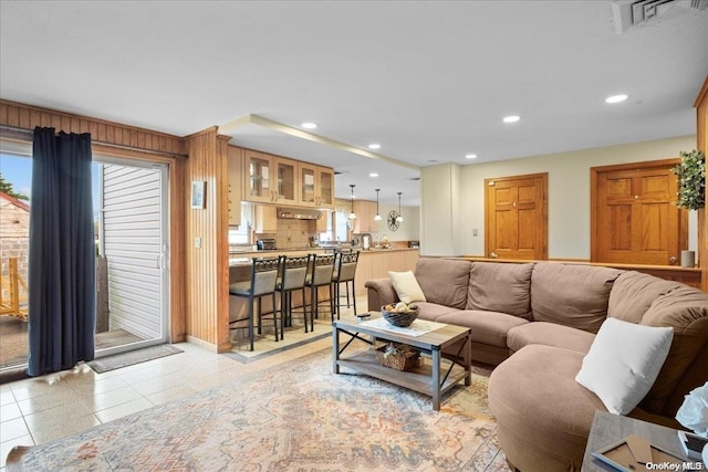 living room with light tile patterned flooring