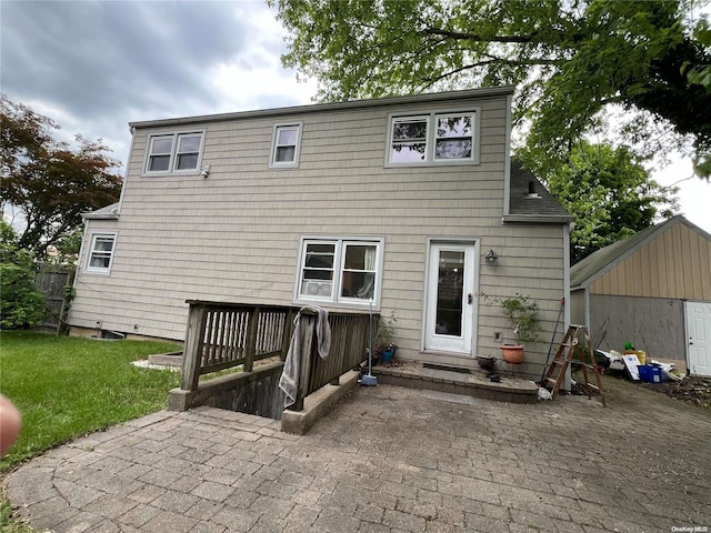 rear view of house featuring a patio area