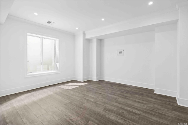 unfurnished room featuring dark hardwood / wood-style floors