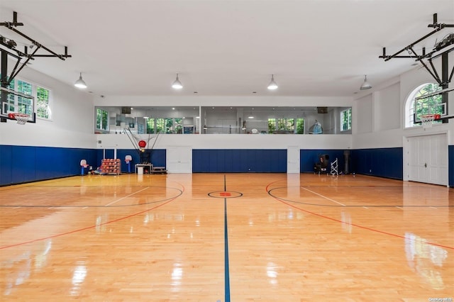 view of sport court featuring a wealth of natural light