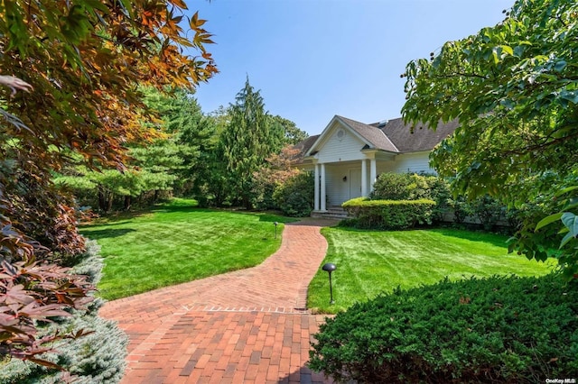 exterior space with a front yard