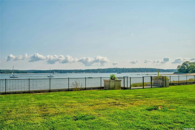 view of yard with a water view