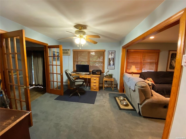 office space with dark colored carpet, ceiling fan, a wall mounted AC, and french doors