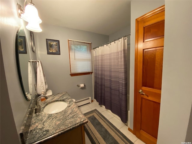 bathroom featuring tile patterned flooring, vanity, shower / bath combo, and a baseboard heating unit