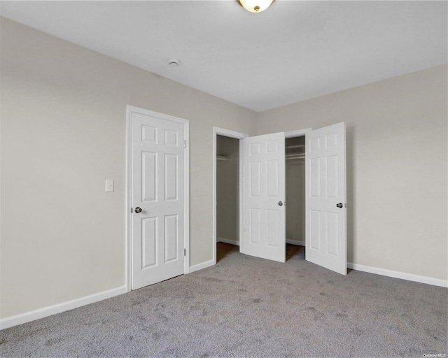 unfurnished bedroom with carpet