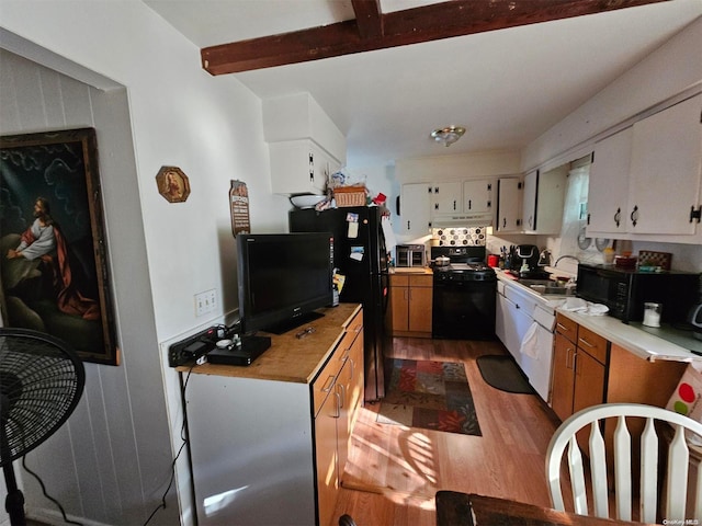 kitchen featuring sink, black appliances, light hardwood / wood-style flooring, beamed ceiling, and white cabinets