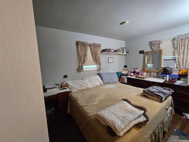 bedroom featuring wood-type flooring