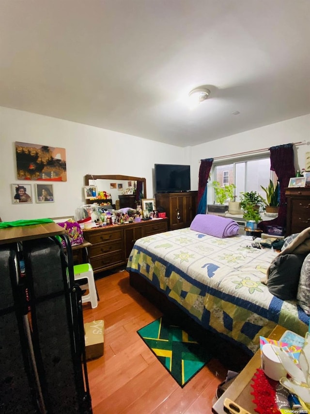 bedroom featuring light hardwood / wood-style flooring