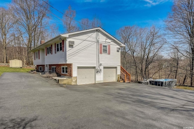 view of property exterior with a garage