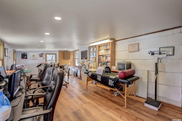 office space with light hardwood / wood-style floors