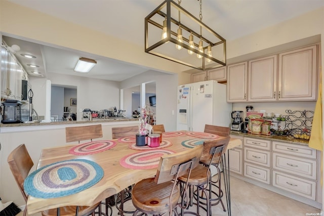 dining room with light tile patterned floors