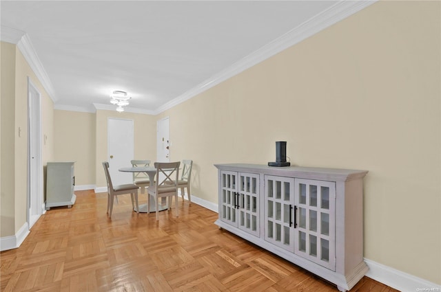 dining area with light parquet floors and crown molding