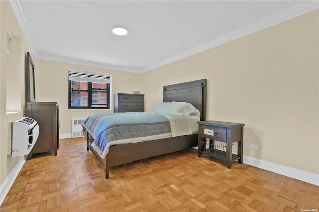 bedroom with heating unit, crown molding, radiator heating unit, and light parquet floors