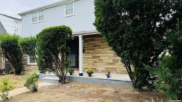 2041 New Hyde Park Rd, New Hyde Park, NY 11040 - back of property with stone siding