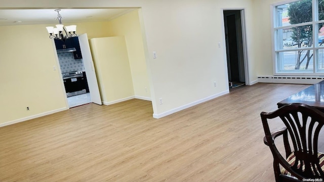 2041 New Hyde Park Rd, New Hyde Park, NY 11040 - dining space featuring a chandelier, a baseboard radiator, crown molding, light wood-style floors, and baseboards
