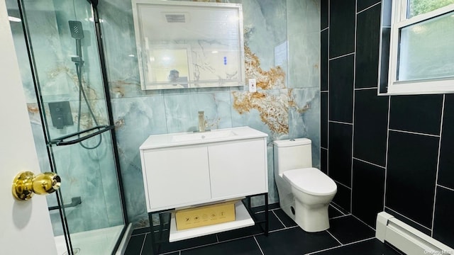 bathroom featuring vanity, tile patterned flooring, tile walls, a baseboard radiator, and a shower with shower door