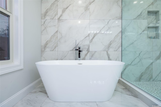 bathroom featuring a washtub