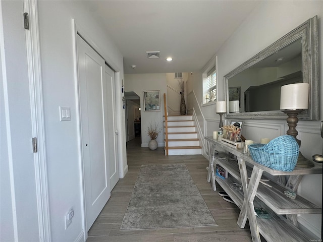 corridor featuring hardwood / wood-style flooring