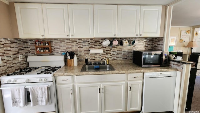 kitchen with white cabinetry, white appliances, and backsplash