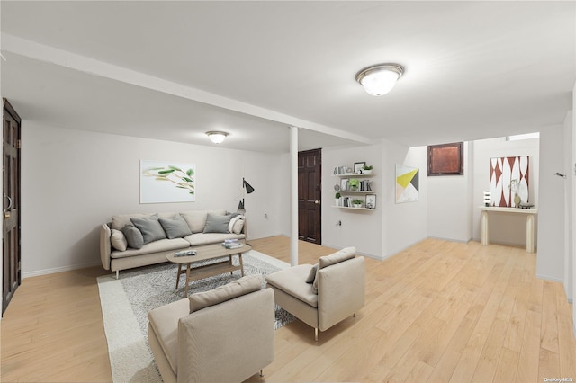 living room with light hardwood / wood-style floors