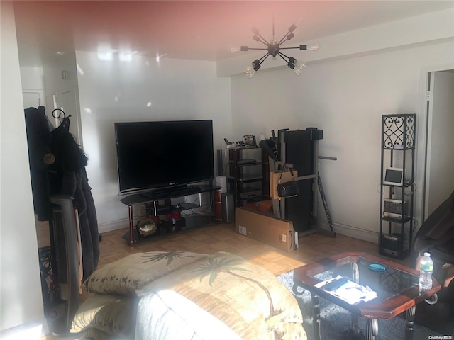 living room featuring a notable chandelier